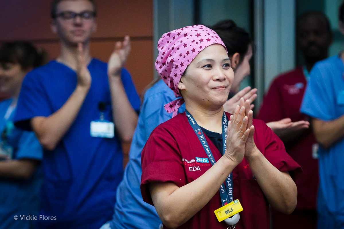 Medical staff clap for carers outside the Royal London Hospital