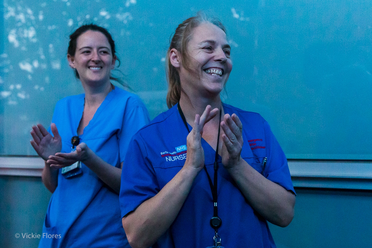 Medical staff clap for carers outside the Royal London Hospital